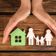Two hands cupped protectively symbolising a family afforded by an actuarial consulting company.